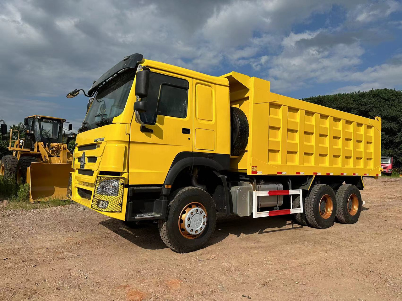 SINOTRUK Howo 371 Dump truck - Autocarro ribaltabile: foto 2 SINOTRUK Howo 371 Dump truck - Autocarro ribaltabile: foto 2