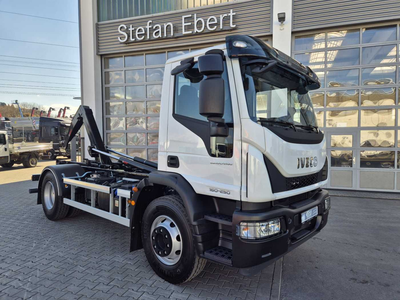 Iveco Eurocargo ML160E25/P HIAB Multilift XR10S4150 - Autocarro scarrabile: foto 1 Iveco Eurocargo ML160E25/P HIAB Multilift XR10S4150 - Autocarro scarrabile: foto 1