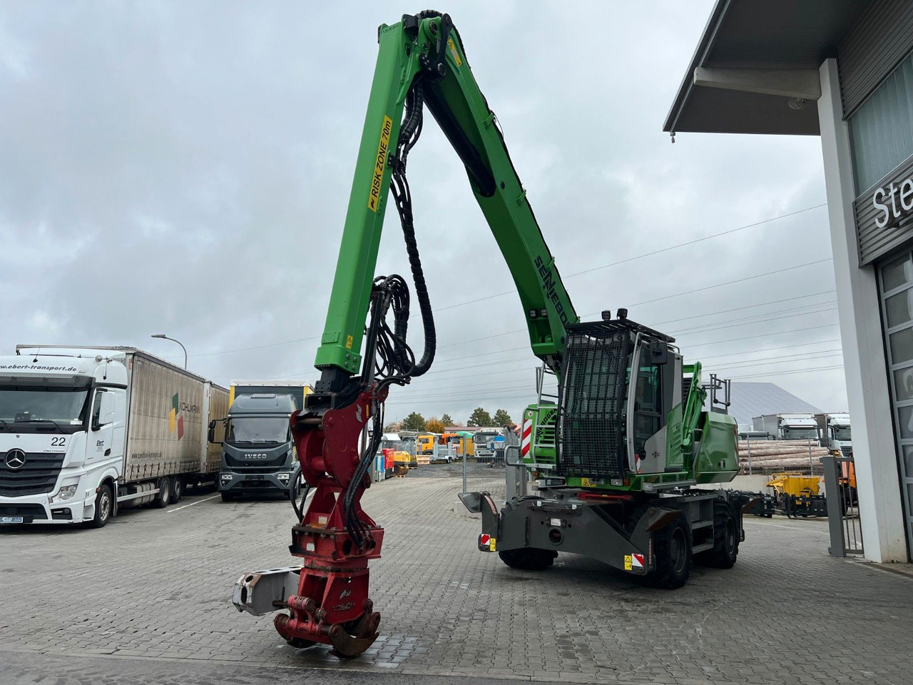 Sennebogen 718 / inkl. Vosch Fällzange / nur 1.965h! - Escavatore gommato: foto 5 Sennebogen 718 / inkl. Vosch Fällzange / nur 1.965h! - Escavatore gommato: foto 5