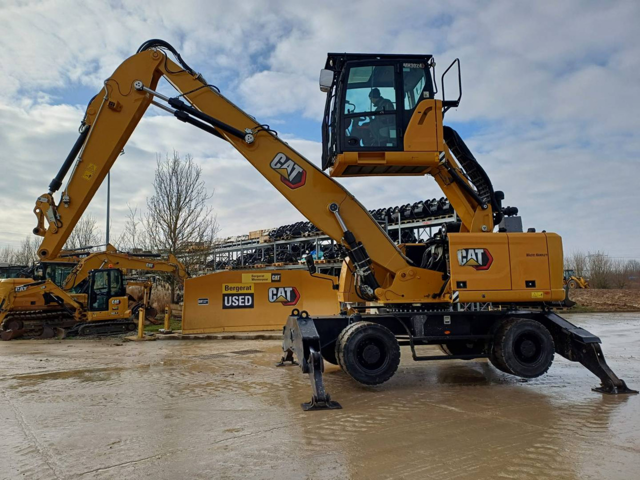CAT MH3024 - Escavatore gommato: foto 1 CAT MH3024 - Escavatore gommato: foto 1