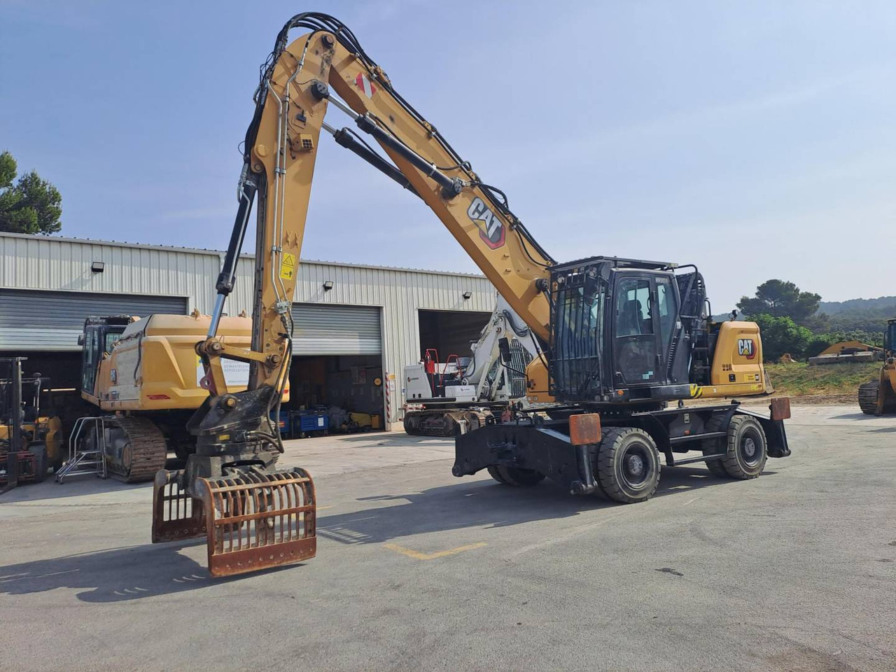 CAT MH3024 - Escavatore gommato: foto 1 CAT MH3024 - Escavatore gommato: foto 1