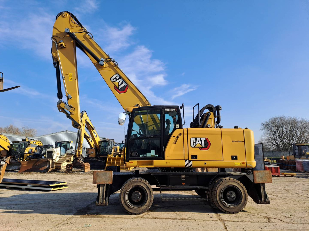 CAT MH3024 - Escavatore gommato: foto 1 CAT MH3024 - Escavatore gommato: foto 1