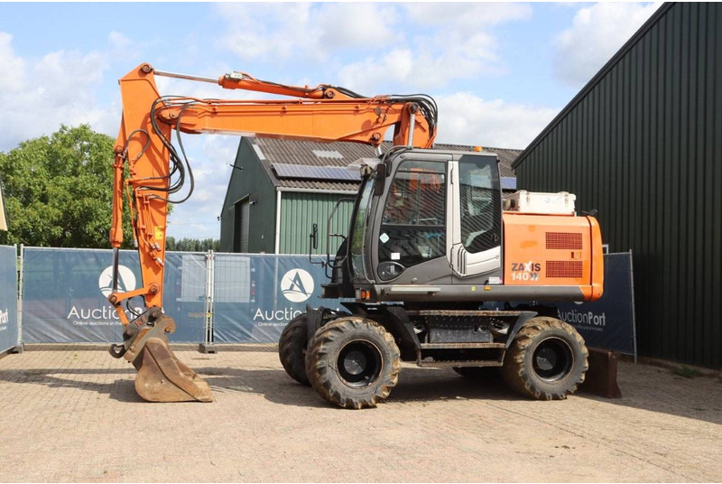 Hitachi ZX140W-3 - Escavatore gommato: foto 1 Hitachi ZX140W-3 - Escavatore gommato: foto 1