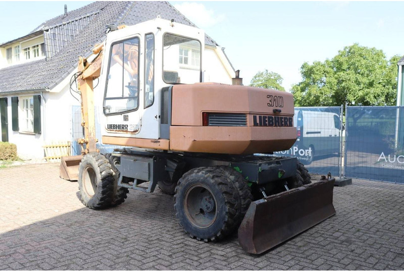 Liebherr A 310 - Escavatore gommato: foto 4 Liebherr A 310 - Escavatore gommato: foto 4