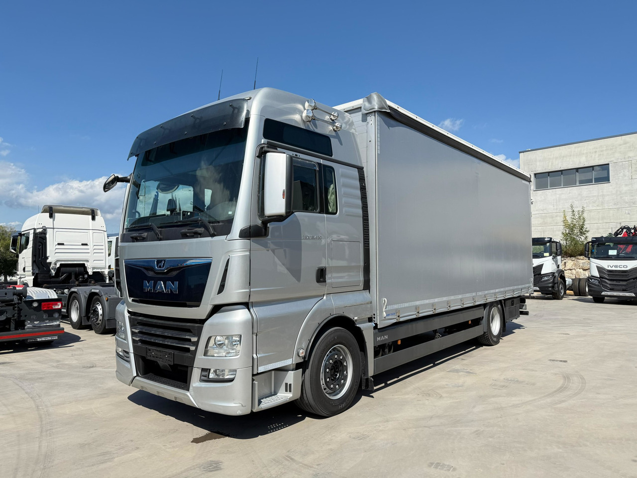 MAN 18.430 LL TGX E6 (Tauliner) - Camion centinato: foto 1 MAN 18.430 LL TGX E6 (Tauliner) - Camion centinato: foto 1