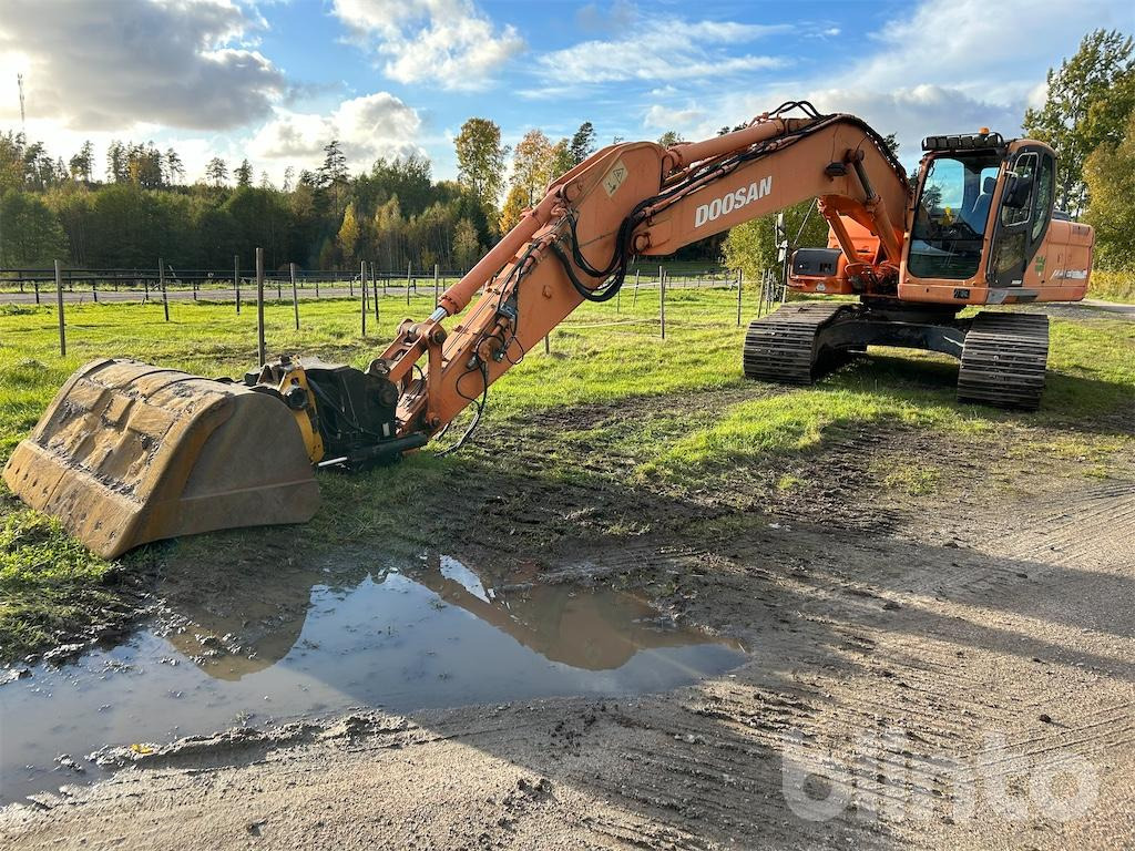 Doosan DX225LC (Låga timmar) - Escavatore cingolato: foto 1 Doosan DX225LC (Låga timmar) - Escavatore cingolato: foto 1