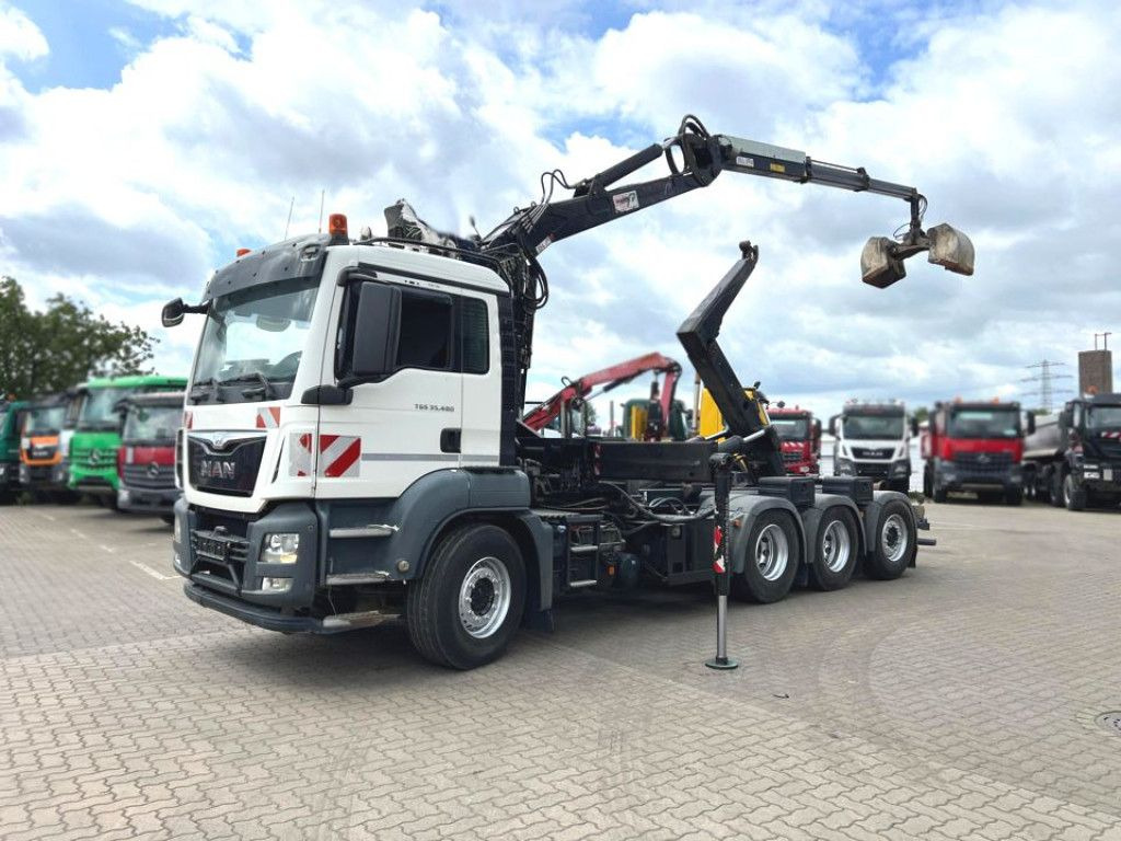 MAN TG-S 35.480 8x4 BL Abrollkipper mit Kran Penz-15 - Autocarro scarrabile, Camion con gru: foto 1 MAN TG-S 35.480 8x4 BL Abrollkipper mit Kran Penz-15 - Autocarro scarrabile, Camion con gru: foto 1